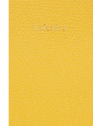 Желтый клатч от Valextra