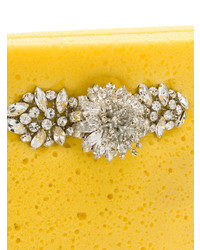 Желтый кожаный клатч с украшением от Christopher Kane