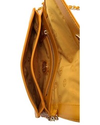 Желтый кожаный клатч от Tory Burch