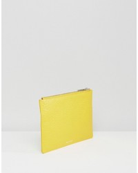 Желтый кожаный клатч от Whistles