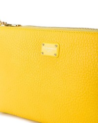 Желтый кожаный клатч от Dolce & Gabbana