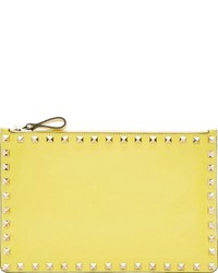 Желтый кожаный клатч от Valentino