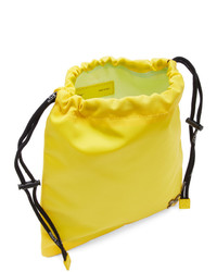 Желтый сатиновый клатч от Off-White