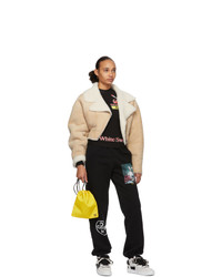 Желтый сатиновый клатч от Off-White