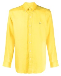 Желтый свитер с воротником поло с вышивкой