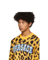 Мужской желтый свитер с круглым вырезом с принтом от Versace