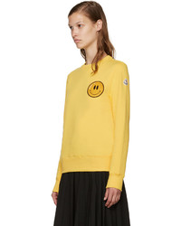 Женский желтый свитер от Moncler