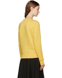 Женский желтый свитер от Moncler