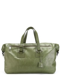 Мужская зеленая кожаная дорожная сумка от Assouline