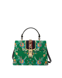 Зеленая кожаная сумка-саквояж от Gucci