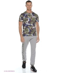 Мужская зеленая футболка с принтом от Puma