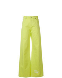 Зелено-желтые джинсы-клеш