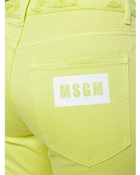 Зелено-желтые джинсы-клеш от MSGM