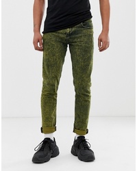 Зелено-желтые зауженные джинсы