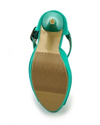 Зеленые босоножки на каблуке от Ideal