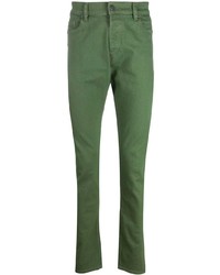 Зеленые зауженные джинсы