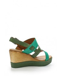 Зеленые кожаные босоножки на танкетке от Wilmar
