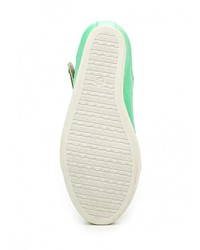 Зеленые кожаные кроссовки на танкетке от Burlesque