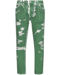 Зеленые рваные джинсы