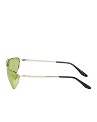 Женские зеленые солнцезащитные очки от Prada