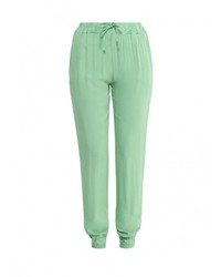 Зеленые узкие брюки от Perfect J