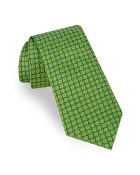 Зеленый галстук с геометрическим рисунком