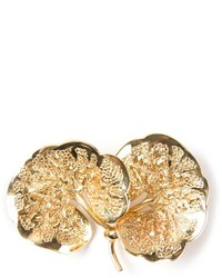 Золотая брошь от Christian Dior