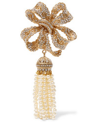 Золотая брошь от Dolce & Gabbana