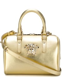 Золотая кожаная большая сумка от Versace