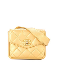 Золотая кожаная поясная сумка от Chanel Vintage