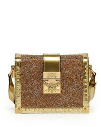 Золотая кожаная сумка с украшением