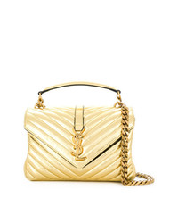 Золотая кожаная сумка-саквояж от Saint Laurent