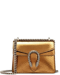 Женская золотая сумка от Gucci