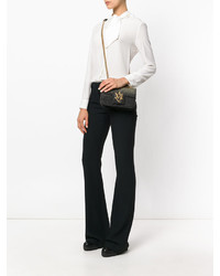 Женская золотая сумка от Alexander McQueen