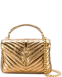 Женская золотая сумка от Saint Laurent