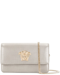 Женская золотая сумка от Versace