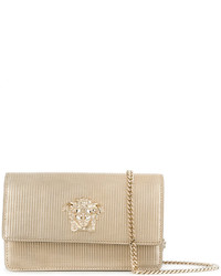 Женская золотая сумка от Versace