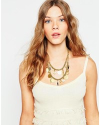 Золотое колье от Made