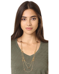 Золотое колье от Tory Burch