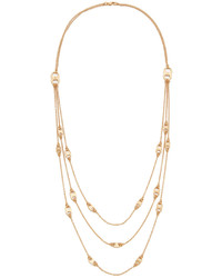 Золотое колье от Tory Burch