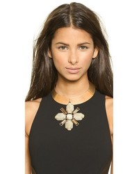 Золотое колье от Tory Burch