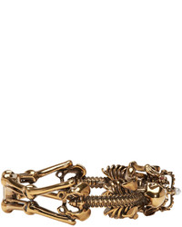 Золотой браслет от Alexander McQueen