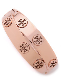 Золотой браслет от Tory Burch