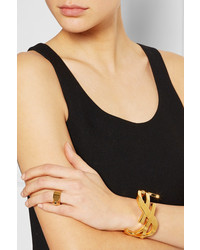 Золотой браслет от Saint Laurent