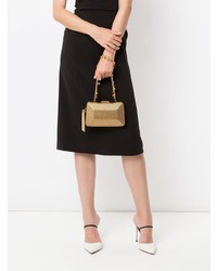 Золотой клатч от Serpui