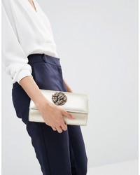 Золотой клатч от Lotus