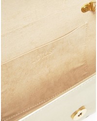 Золотой клатч от Lotus