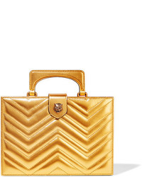 Золотой кожаный стеганый клатч от Gucci