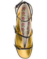 Золотые балетки от Gucci