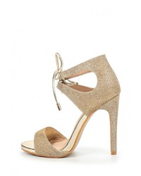 Золотые босоножки на каблуке от Stephan
